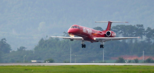 red embraer erj145 landing on runway in south korea